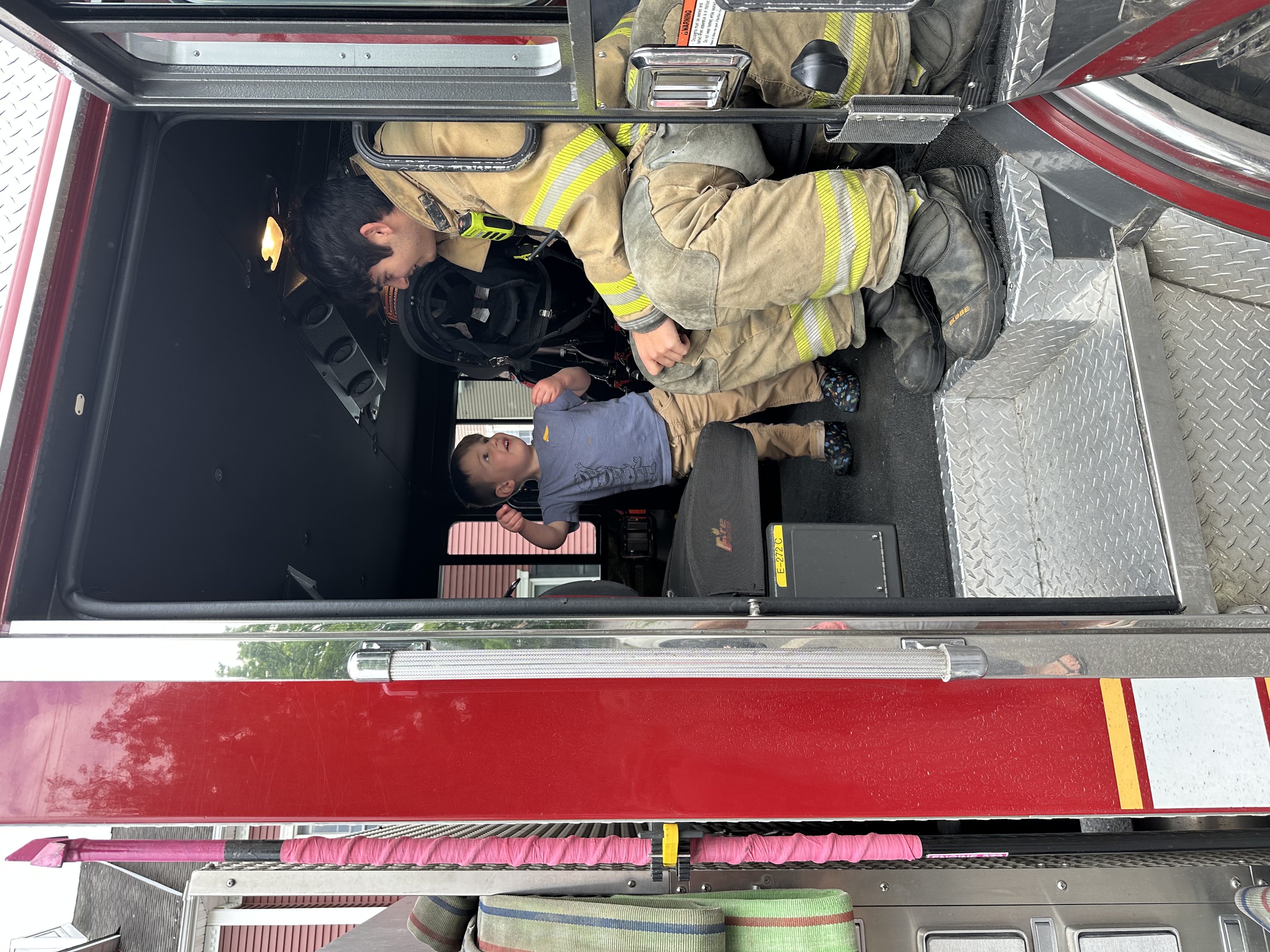 At dinner with my family and some kid (not Theo) decides to pull the fire alarm! We were sitting outside, so no big deal, but Theo did get to play in the firetruck!